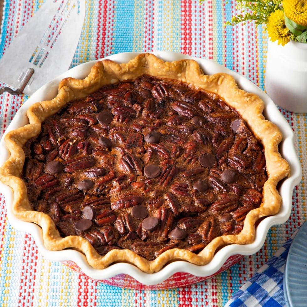A delicious pie topped with an abundance of chocolate chips, showcasing a tempting dessert ready to be enjoyed. does Pecan Pie Need to Be Refrigerated?